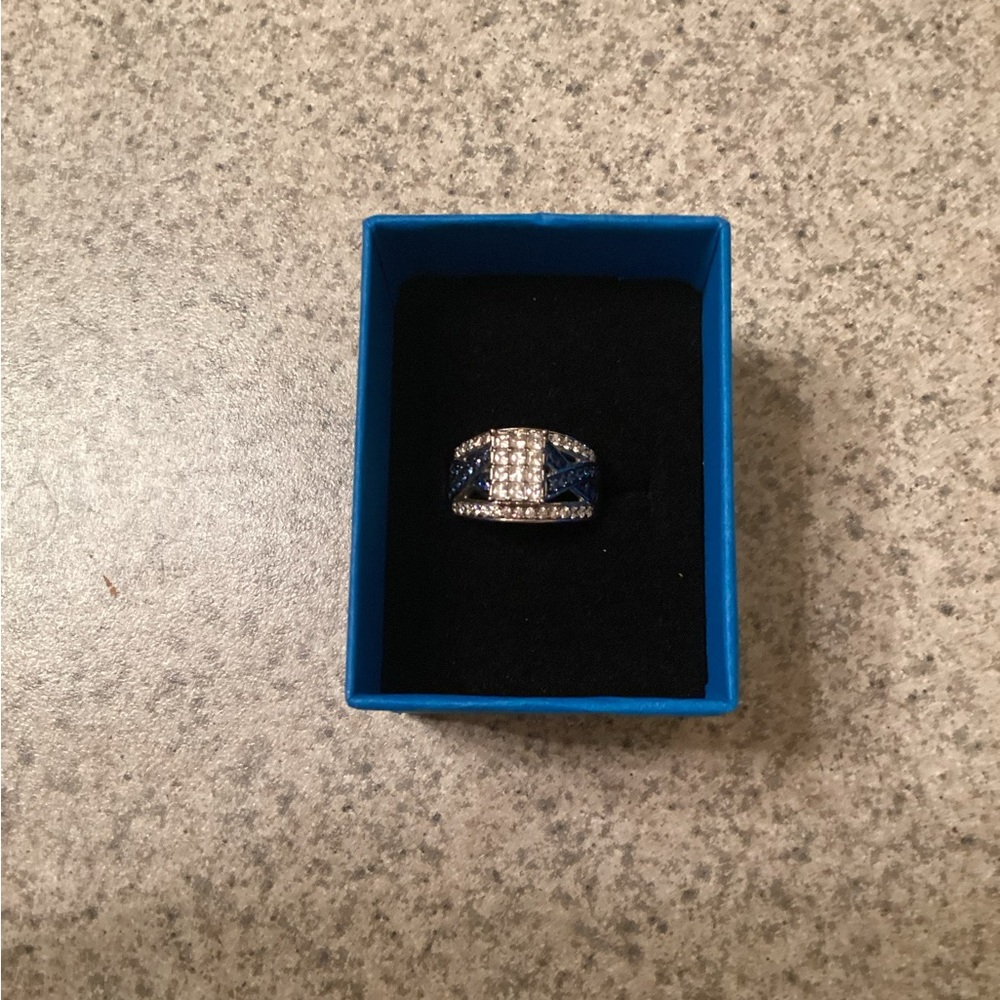 Blue and white simulated diamond ring.